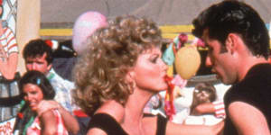 Olivia Newton-John as Sandy playing opposite John Travolta as Danny in Grease.