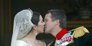 Then-crown prince Frederik kisses his bride,Mary Donaldson,on the balcony of the Amalienborg Palace in Copenhagen,in May 2004.