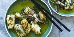 Barbecued squid with onion,parsley and oregano.