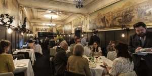 Italianate murals are a feature of Florentino's opulent dining room.