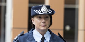 AFP acting assistant commissioner Joanne Cameron leaves the inquiry in Canberra on Thursday.