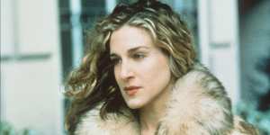 Sarah Jessica Parker wearing fur in publicity still for Sex and the City.