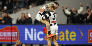 Jamie Elliott celebrates with Jack Ginnivan after scoring the winning goal against Carlton