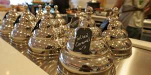 Spectacular chrome domes cover deep barrels of ice-cream.