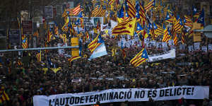 Independence demonstrators wave esteladas or independence flags during a demonstration supporting the imprisoned pro-independence political leaders in Barcelona on Saturday.