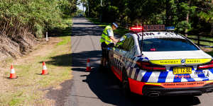 Roads near the home remained closed on Friday afternoon.