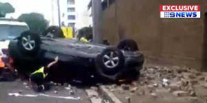 Driver's lucky escape after crashing through second level of car park