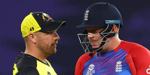 Australia captain Aaron Finch and England’s Jonny Bairstow interact following their T20 World Cup match.