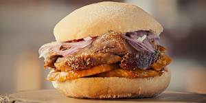 Pan con chicharron … a pork sandwich with slices of sweet potato and salsa criolla.