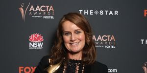 Elise McCredie poses with the AACTA Award for best television screenplay for Stateless.