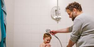 Stefano Baldo bathing his son,Ruben,before bedtime.