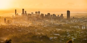 Sunrise over the City skyline of Brisbane from the Mt Coot-tha lookout. 