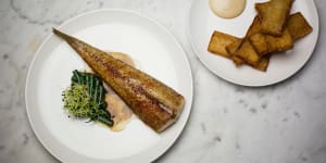 Roasted flathead tail,with a side dish of potato chips served at the Paddington Inn in Sydney.