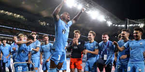 Douglas Costa leads the celebrations for Sydney FC.