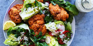 Buttermilk fried chicken cutlets with iceberg wedges,jalapeno and coriander dressing.