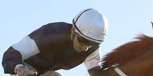 Jason Collett wins the Sydney Cup on Changingoftheguard.