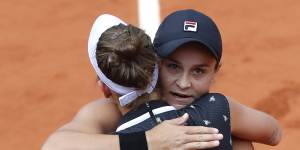 Australia's Ashleigh Barty hugs Marketa Vondrousova.