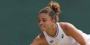 Jasmine Paolini plays a forehand return to Barbora Krejcikova.