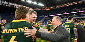 Kevin Walters celebrates the Ashes victory with Cameron Munster and Angus Crichton.