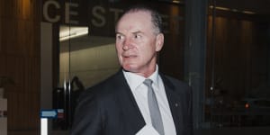 Former Wallabies captain turned Bell Potter managing director Simon Poidevin leaving the Administrative Appeals Tribunal.
