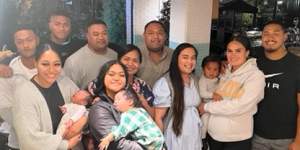 The Fainu family gather on Tuesday night to celebrate Samuela’s NRL call-up.