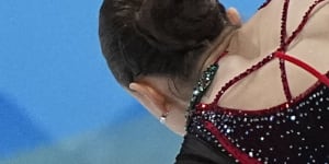 Kamila Valieva falls during the women’s free skate program on Thursday.