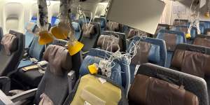 The interior of Singapore Airlines flight SQ321 after the emergency landing at Bangkok Airport.
