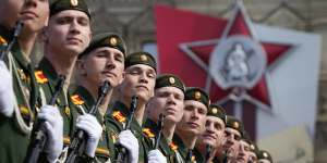Russian servicemen march during a dress rehearsal for the Victory Day military parade in Moscow on Saturday,May 7.