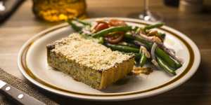 Leek and truffle tart with green beans,cherry tomatoes and almonds.