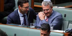 Labor MP Josh Burns consoles Mark Dreyfus after he spoke during a condolence motion for the victims of the Bondi antisemitic terror attack.