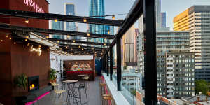 The Stolen Gem's outdoor terrace features a tiled bar,neon signage and a retractable roof.