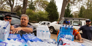 Community members from Russell Vale deliver water,food and other supplies for families affected by bushfires. 