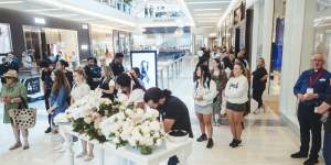 Dozens of bouquets and hundreds of moments of sorrow:Inside Westfield Bondi Junction