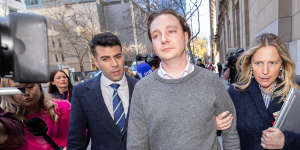 Lynn’s son Geordie is escorted from court by lawyers on Tuesday.