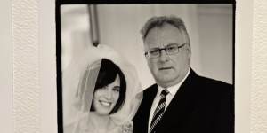 The author and her father on her wedding day in Canberra,in 2001.
