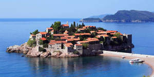 Instantly recognisable ... Sveti Stefan - the beautiful little islet off the Adriatic just south of Budva,connected to the mainland by a small isthmus.