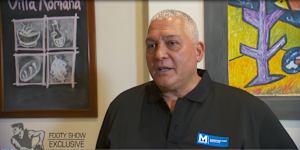Mick Gatto wearing a shirt with an M Group logo in 2017.