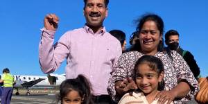 The Nadesalingam family at the airport.