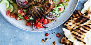 Barbecued lamb cutlets with spicy mint and cucumber salsa.