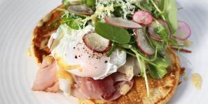 Poached egg and patato pancakes.