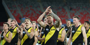 A victorious Richmond leave the Gold Coast ground.