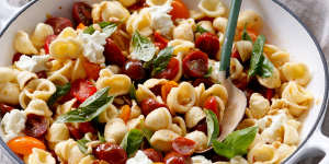 Summer pasta with cherry tomatoes,basil and pine nuts.