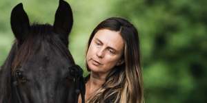 Anna Ludvik with her surviving horse,Willis.