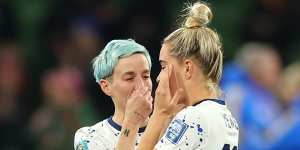 Megan Rapinoe and Kristie Mewis of USA show dejection after the team’s defeat.