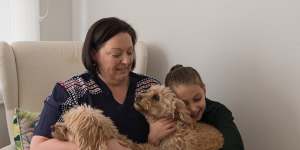 Belinda Renshaw,daughter Matilda and their dogs. The tax cuts may mean some nice steak on the dinner menu.