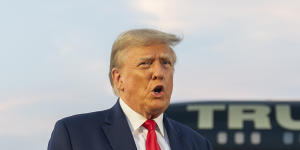 FILE - Former President Donald Trump speaks with reporters before departure from Hartsfield-Jackson Atlanta International Airport,Thursday,Aug. 24,2023,in Atlanta. Trump has pleaded not guilty and waived arraignment in the case accusing him and others of illegally trying to overturn the results of the 2020 election in Georgia. (AP Photo/Alex Brandon,File)