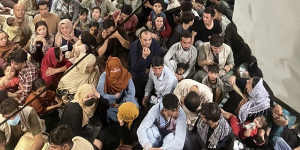 Afghan citizens are evacuated by the US Air Force from Hamid Karzai International Airport in Kabul.