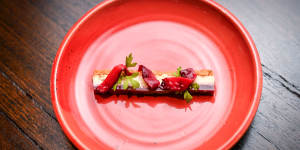 Blue cheese cheesecake with walnuts and tamarillos.