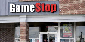 GameStop,AMC shares sink as Reddit trade runs into restrictions