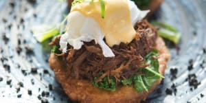 Bluestone Benedict:Roti piled with braised beef cheek,kale,poached egg and hollandaise.